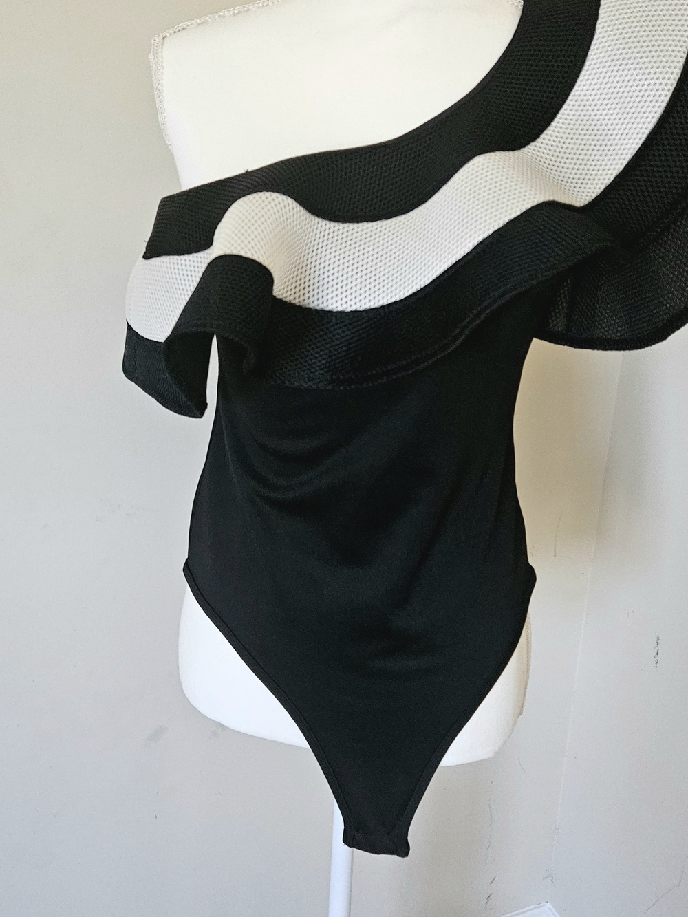 Fashionova Women’s One-Shoulder Black & White Ruffle Bodysuit